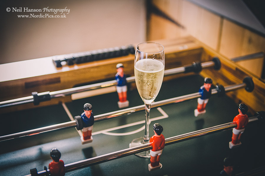 Glass of Champagne & table football