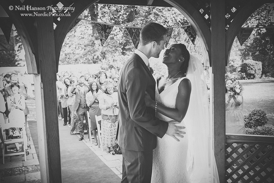 Bride and Grooms first kiss at a Worton Hall Wedding