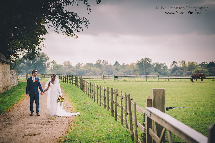 Bride and Groom with rural views at Worton Hall Wedding
