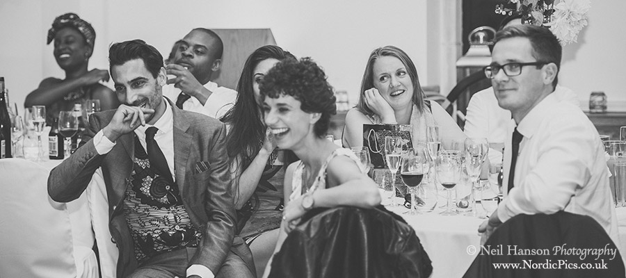 Guests laughing at the speeches
