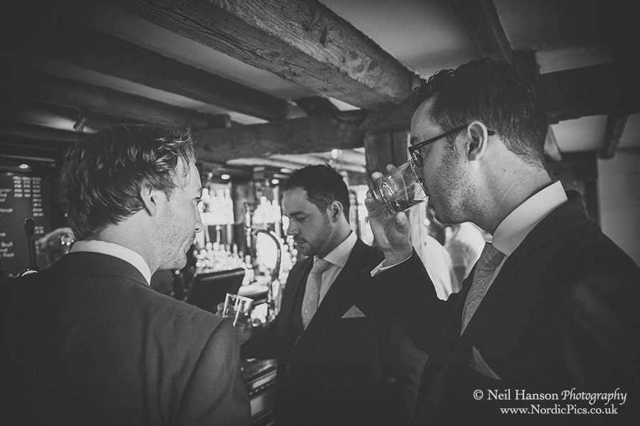 Groom & Best men having a pre ceremony drink in Abingdon