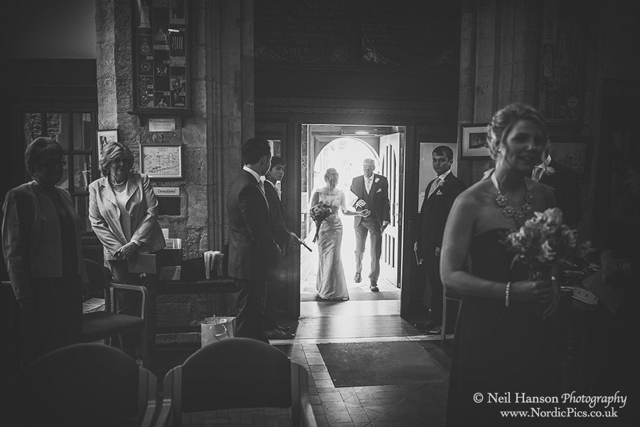 Bride and her father enter St Nicolas church for the wedding ceremony