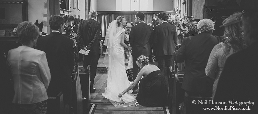 Groom greets his bride for the first time at St Nicolas Church Abingdon