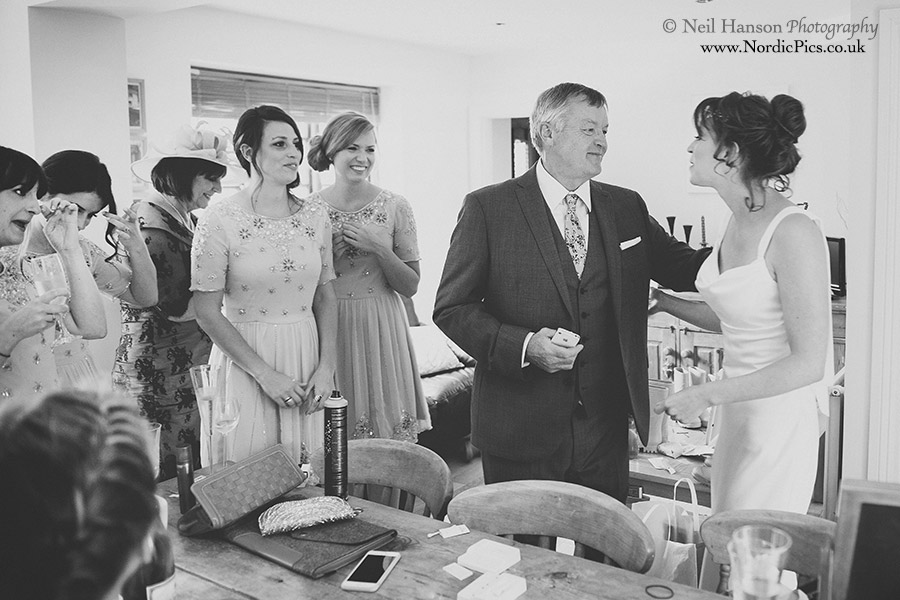 Father of the Bride greets his daughter for the first time in her dress