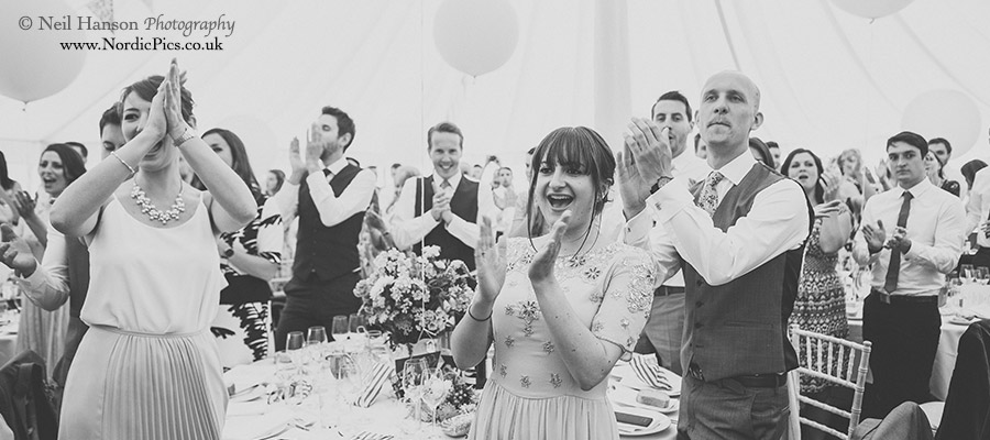 Wedding guests applauding