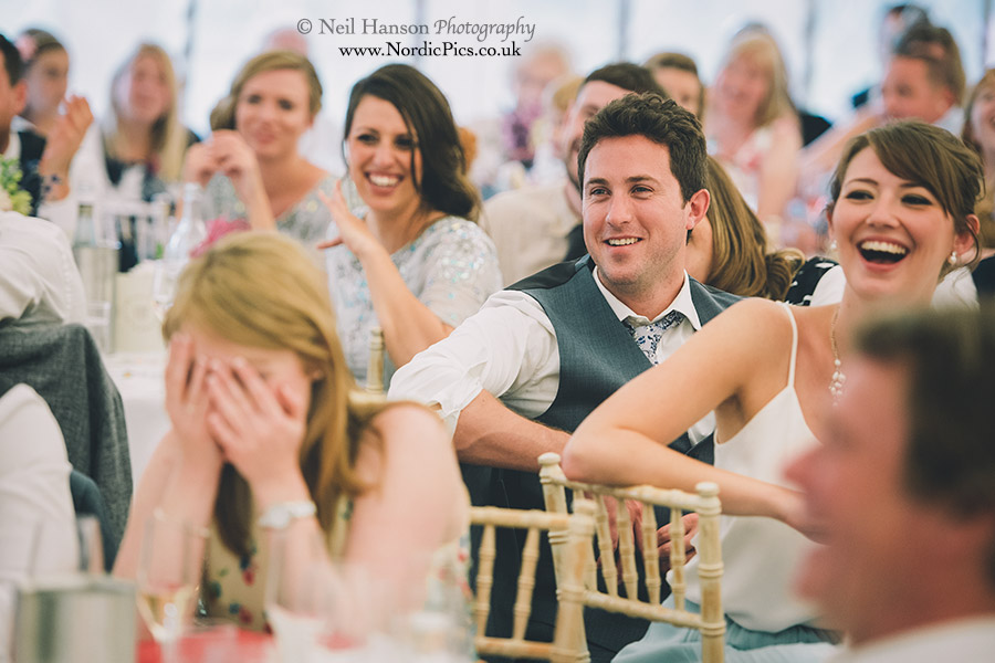 Wedding guests enjoying the speeches