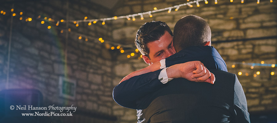 Groom cries during the first dance of his same sex marriage at caswell