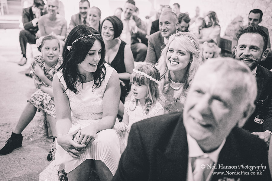 Wedding guests laughing