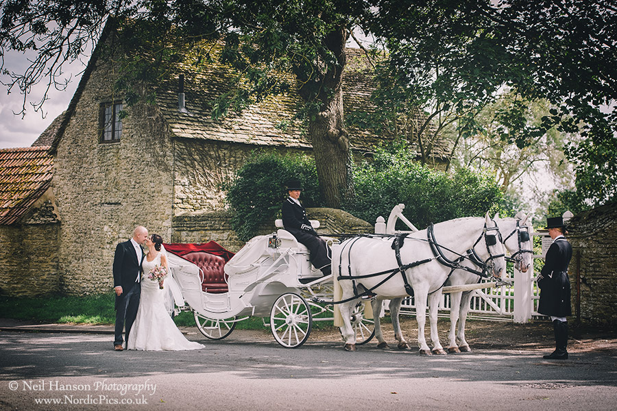Bride and Groom with Horse and Carriage at Cogges Farm Wedding