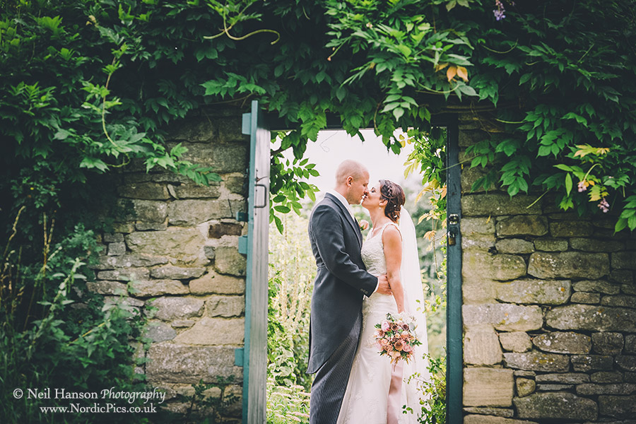 Bride and Groom on their Wedding day at Cogges Farm