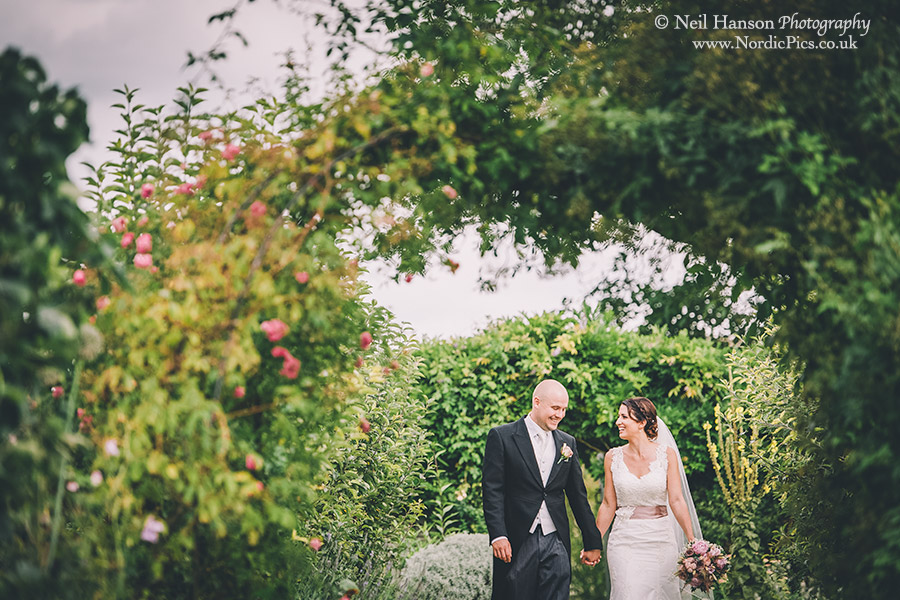 Bride and Groom in Cogges Farm gardens