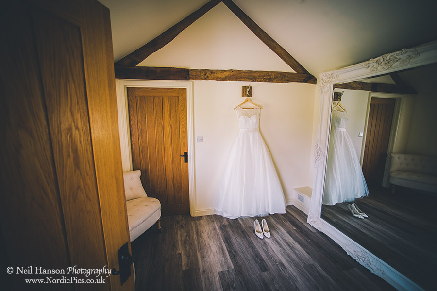 Wedding dress hanging in the dressing rooms at Caswell House