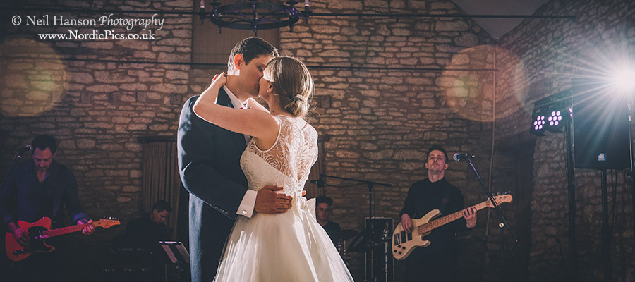 Bride and Groom kiss during their first dance