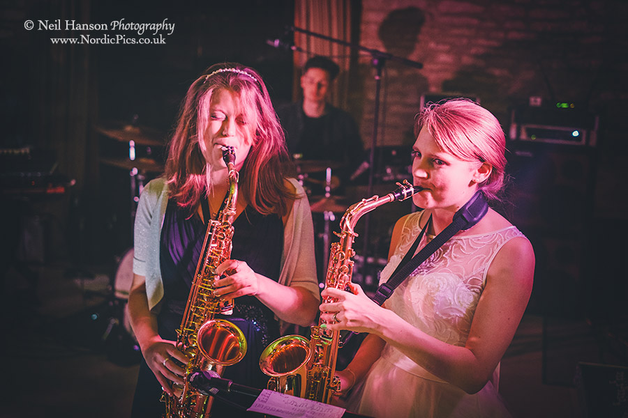 Bride and Bridesmaid playing the Saxophone