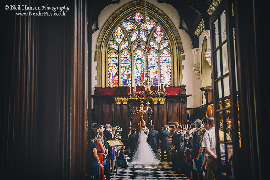 Bride and Groom at the alter at University College Oxford Wedding