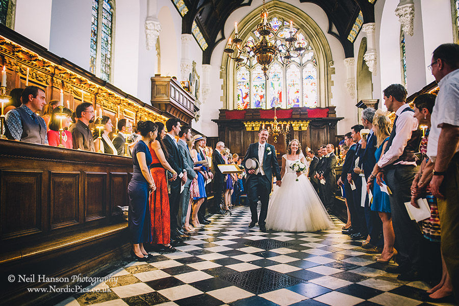 Bride & Groom leaving the Chapel at University College Oxford after their wedding ceremony