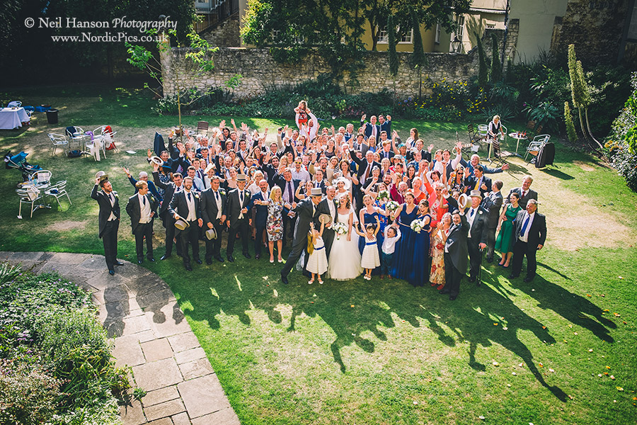 Large group photo at a University College Wedding in Oxford