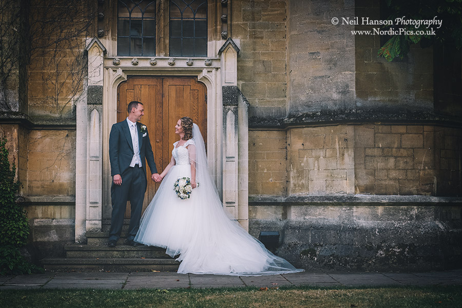 Bride and Groom on their Wedding day at University College Oxford
