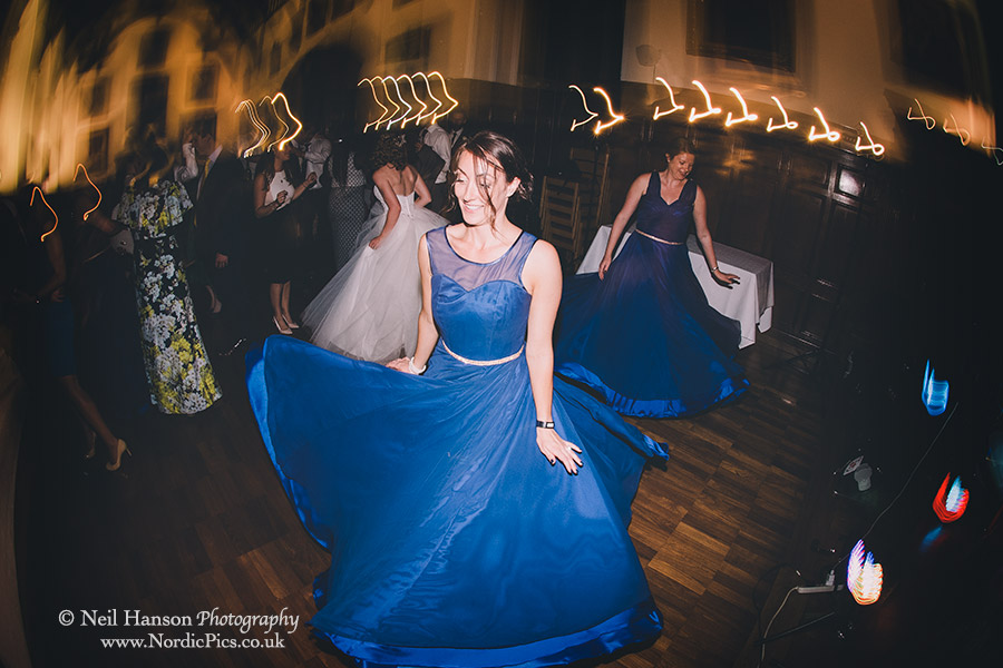 Bridesmaids twirling their dresses