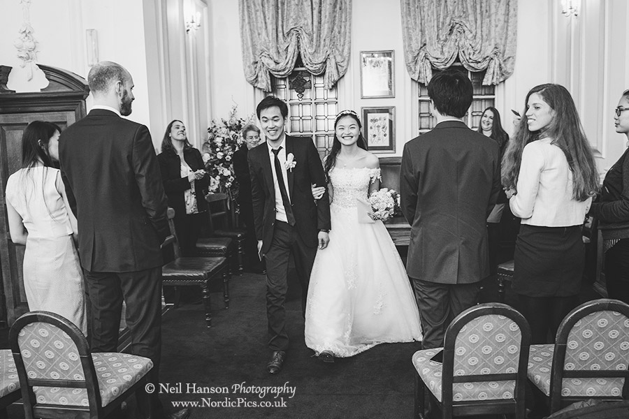 Bride and groom exit their wedding ceremony at Oxford Registry office
