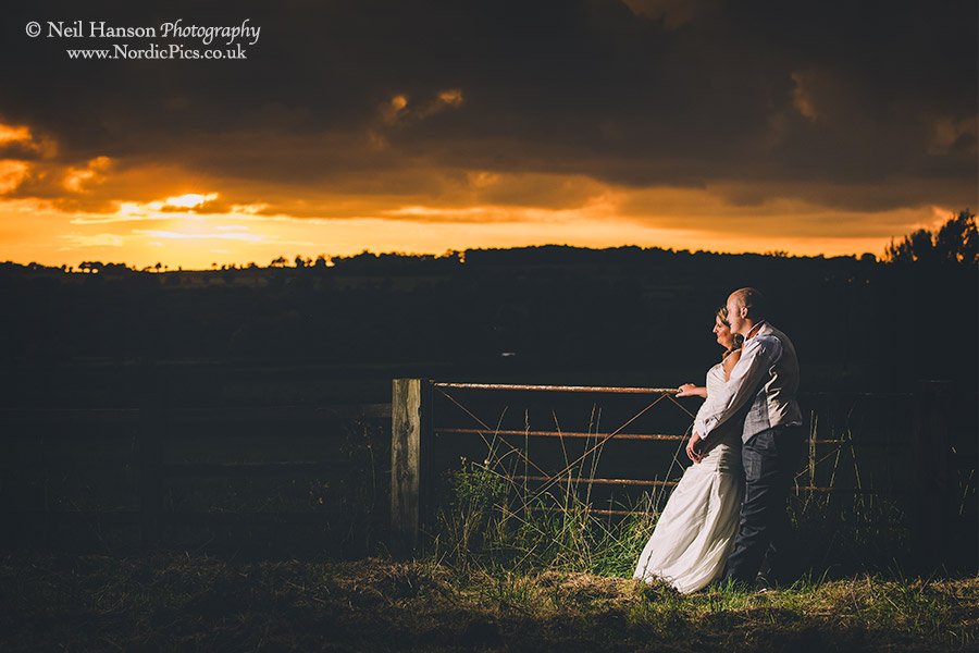 Bride and Groom enjoying a Hyde Barn Wedding Sunset