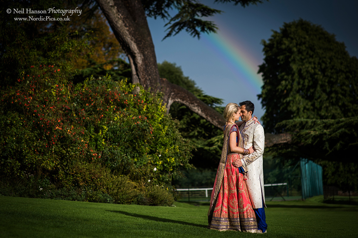 Bride and Groom and a rainbow at Ardington House Wedding