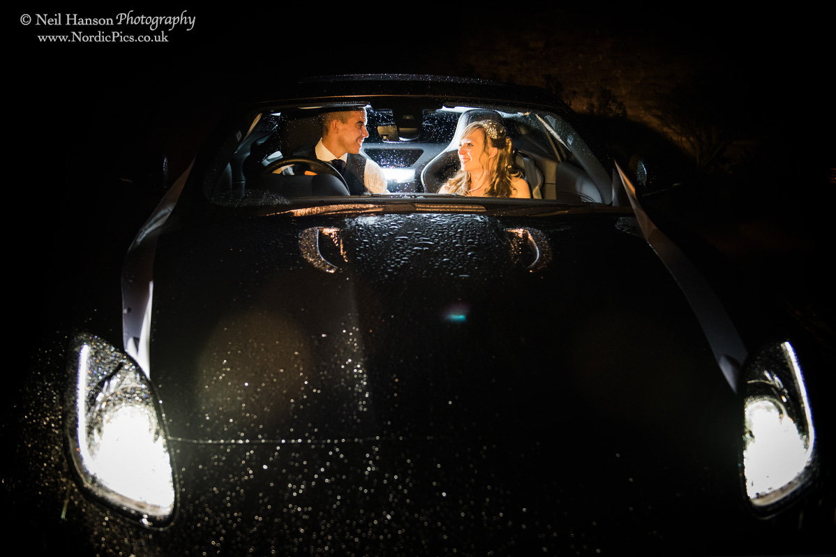 Bride and Groom in their Wedding car at Caswell House
