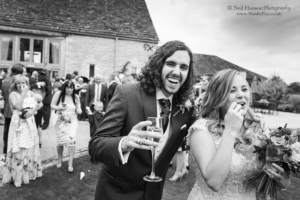 Bride and Groom after confetti throwing at Caswell House