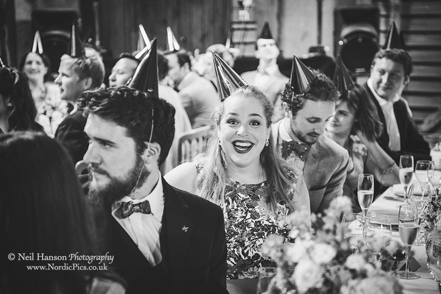Wedding guests laughing at the speeches