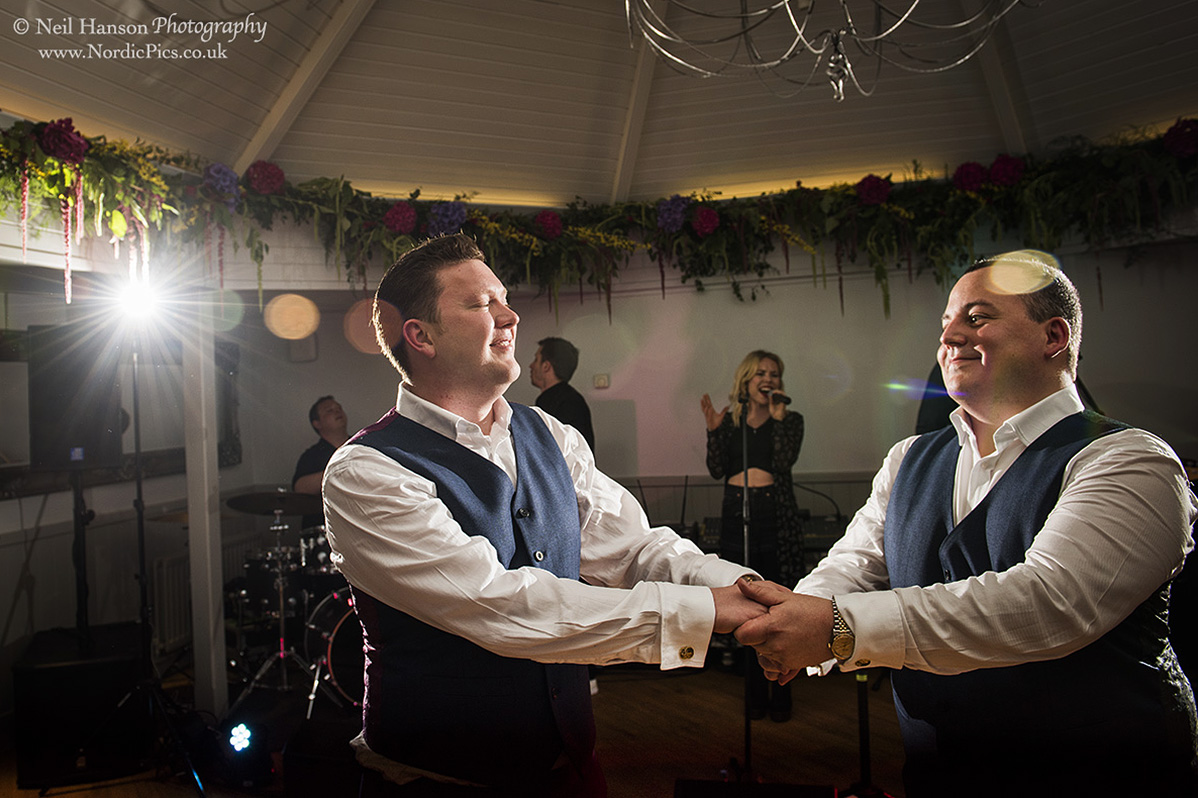 Grooms together and their first dance