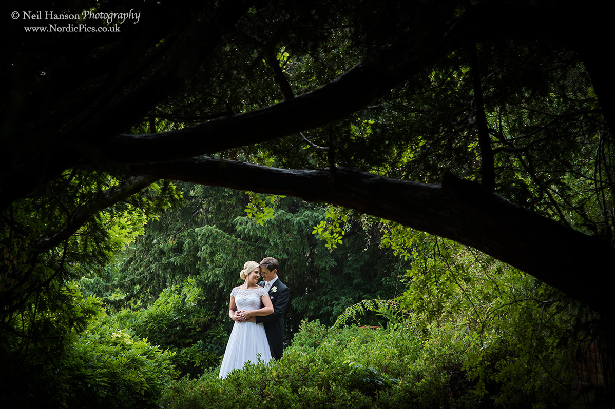 Bride and Groom in the gardens of Kingston Bagpuize House