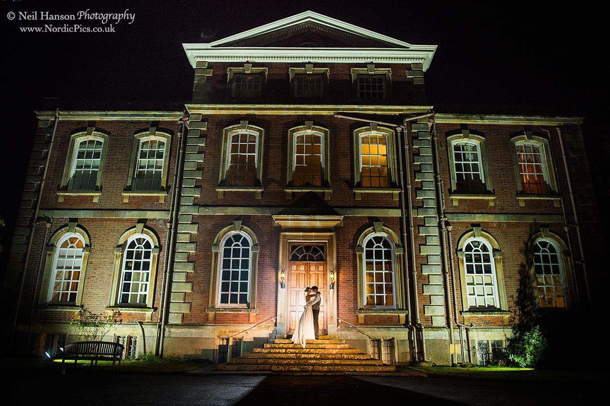 Bride and Groom outside Kingston Bagpuize House at night