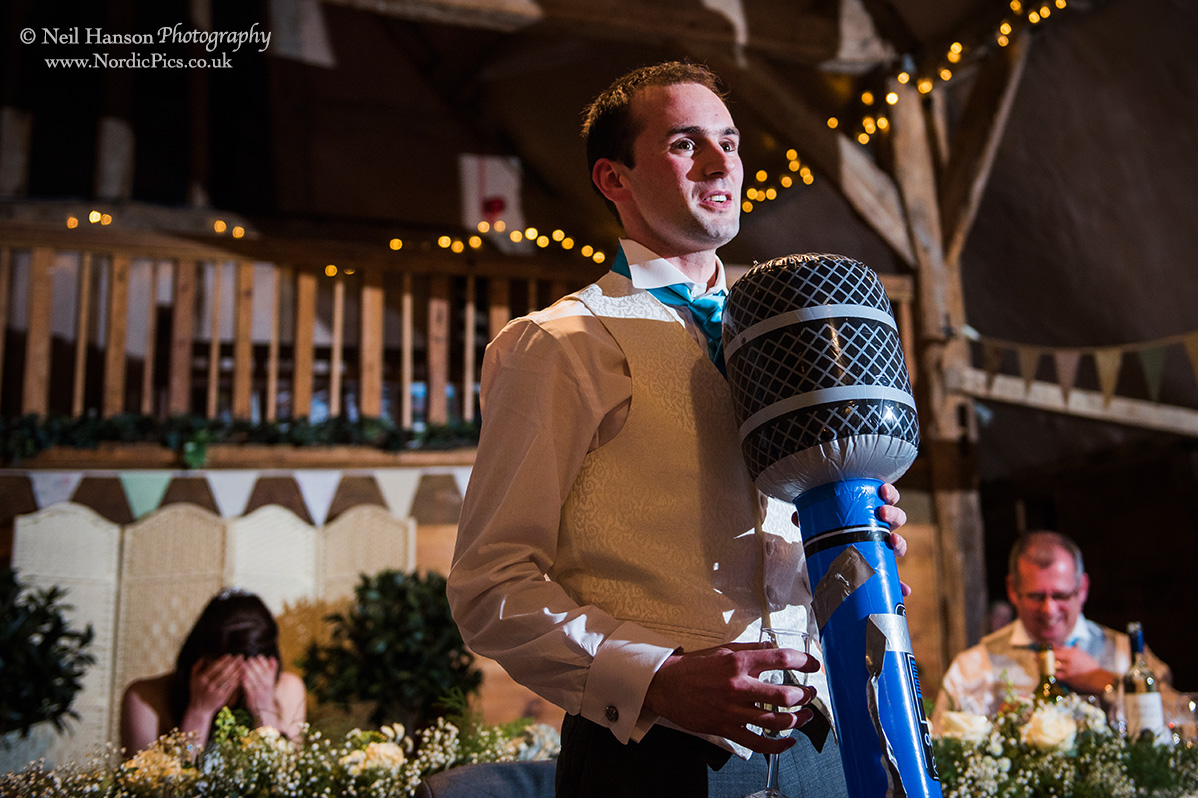 Groom with a very large microphone
