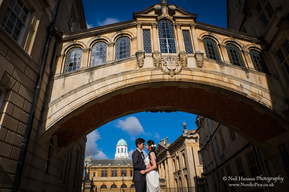 Bride and Groom under the Bridge of Sighs in Oxford