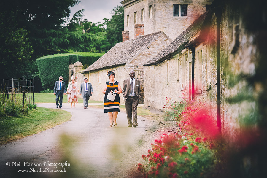 Wedding guests arriving at Rousham Church