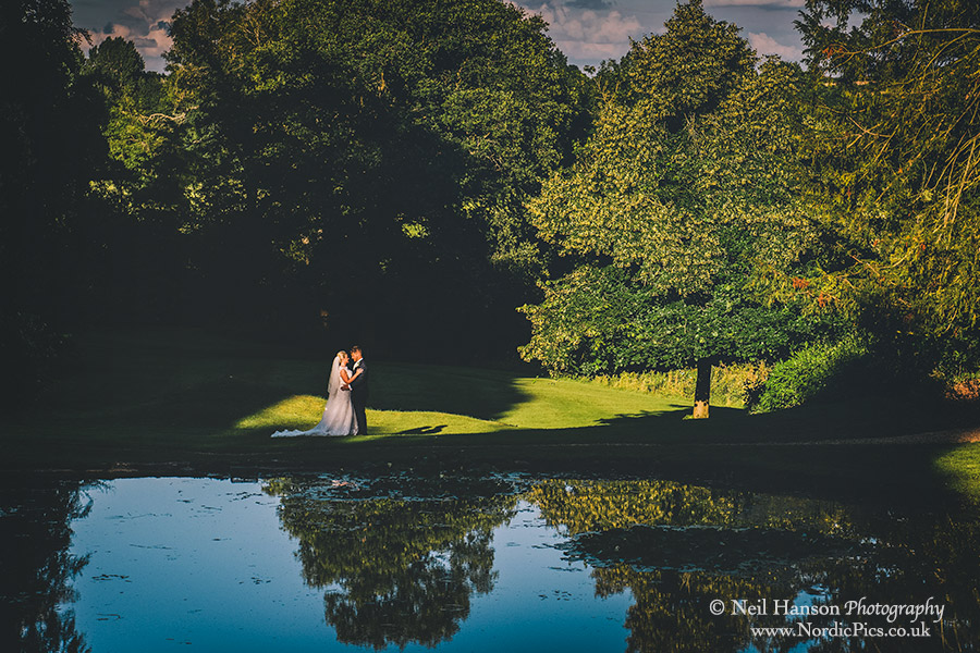 Bride and Groom in the evening sun at their Rousham House Wedding