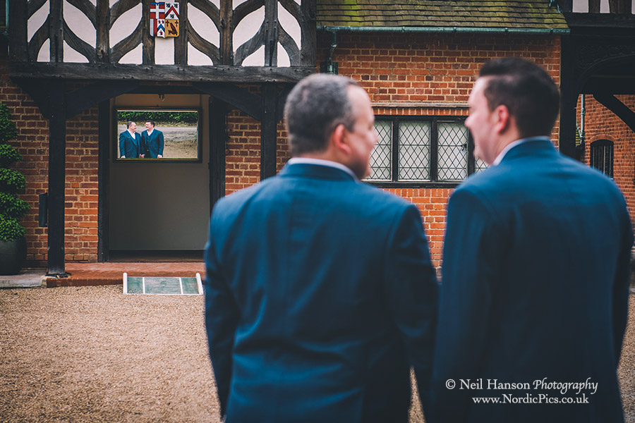 Grooms reflected at Hever Castle