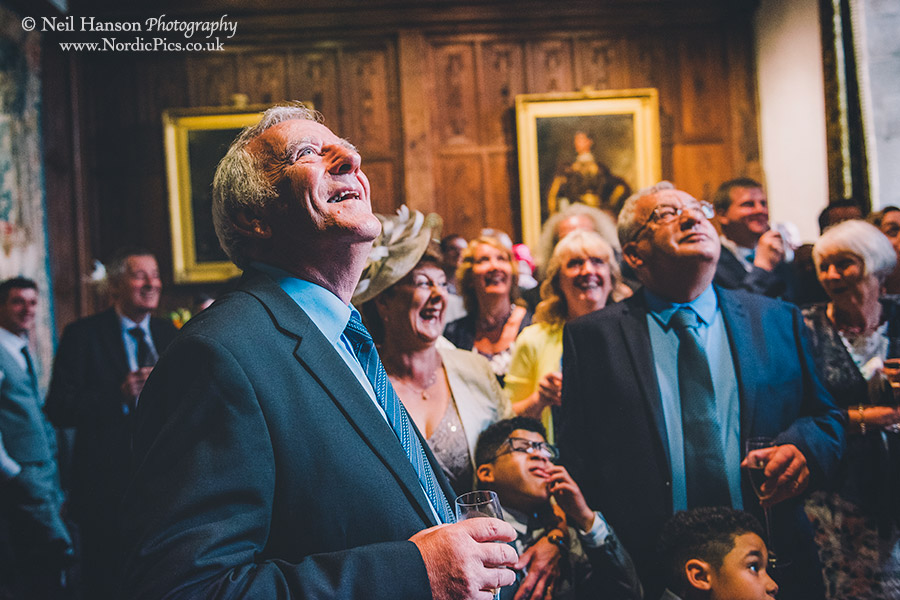 Guests enjoying the wedding speeches at Hever Castle
