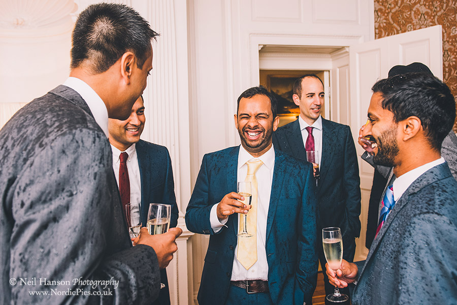 Wet Wedding guests at Ardington House laughing