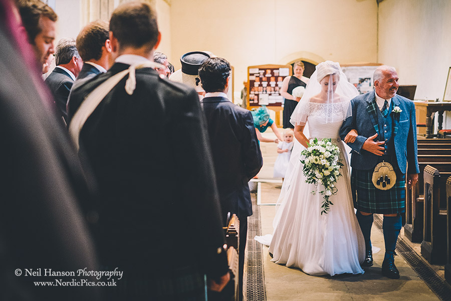 Bride and Father walk down the aisle at Dorchester Abbey
