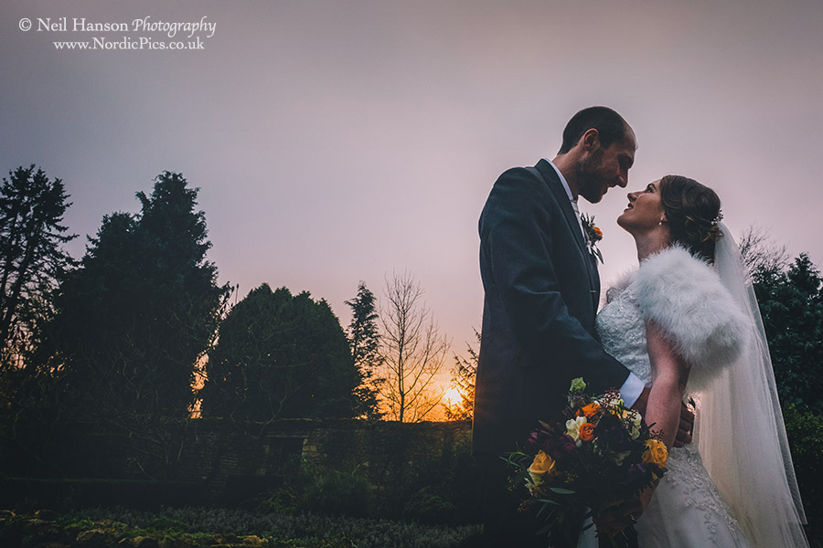 Bride and Groom at Sunset on their Winter Wedding day at Caswell House