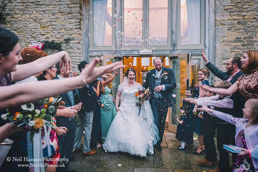 Confetti throw at Caswell House on a Winter Wedding day