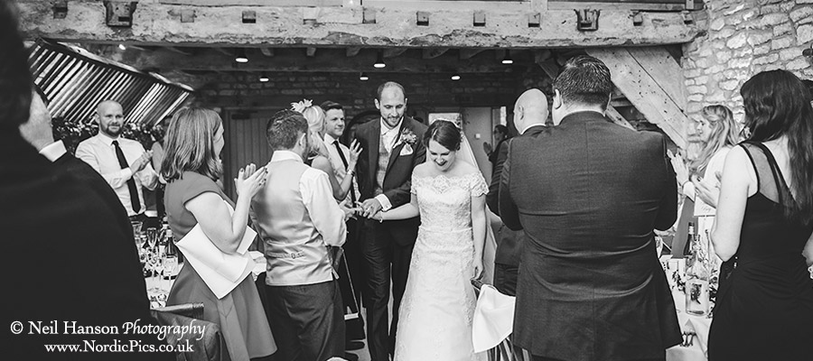 Bride and Groom enter their Wedding Breakfast at Caswell House