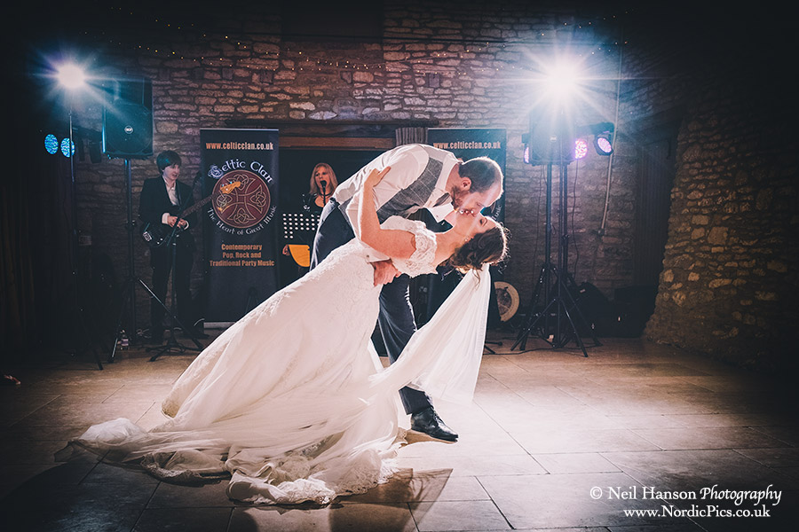 Bride and groom kiss after their first dance at Caswell House