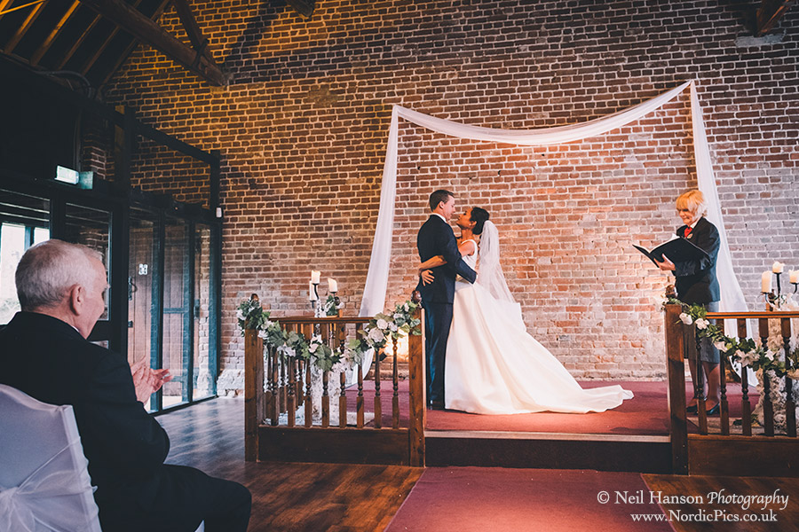 Wedding ceremony at Cooling Castle Barn in Kent