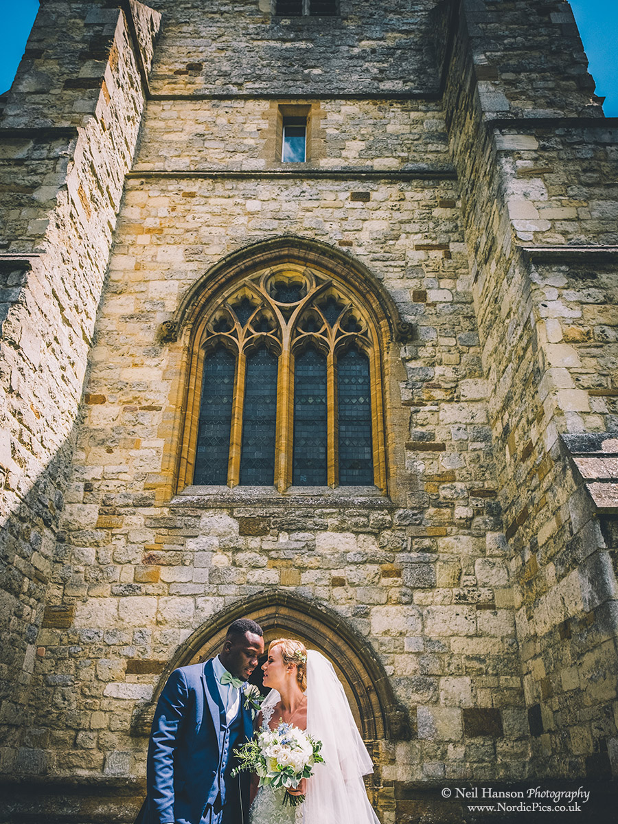 Bride and Groom outside Waddesdon Church just after getting married