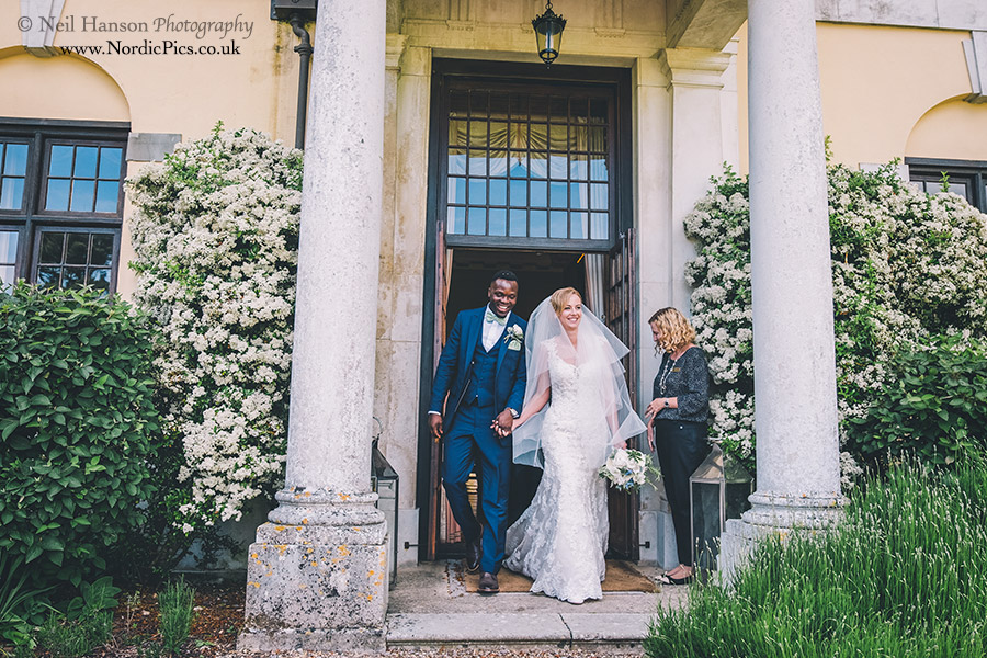 Bride and Groom are greeted by their guests on arrival at Hampden House
