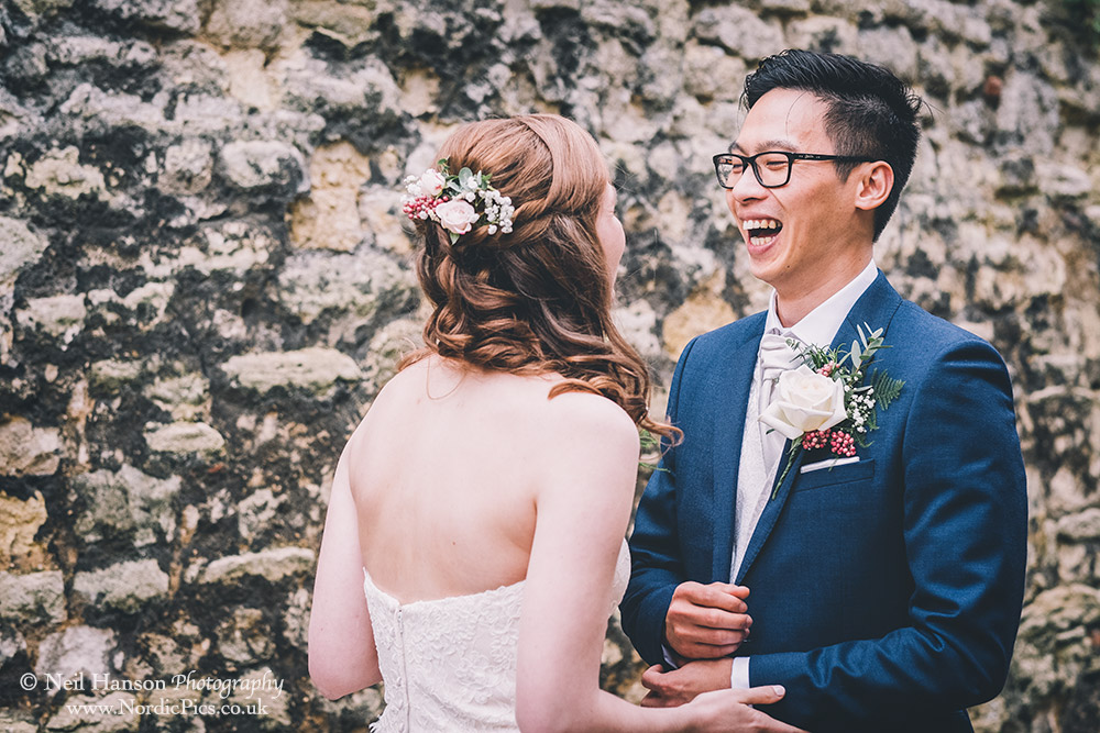 Bride and Groom share a joke on their First Look Wedding day in Oxford