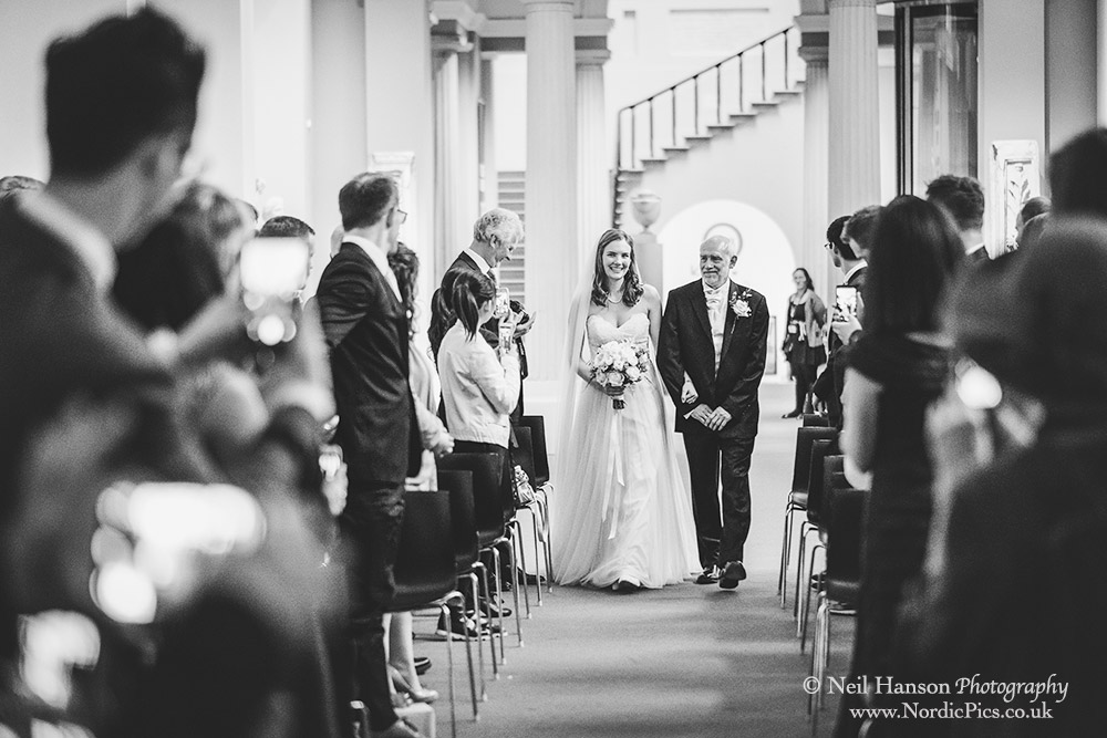 Bride and her father arrive at the Ashmolean Museum for her wedding ceremony