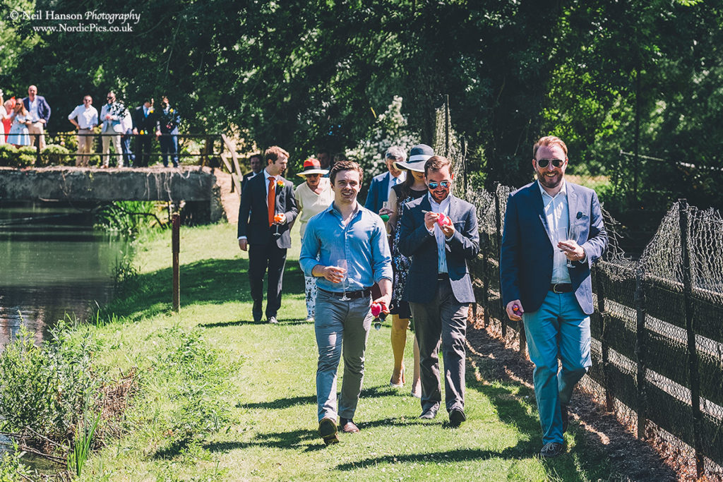 Wedding guests involved in a duck race
